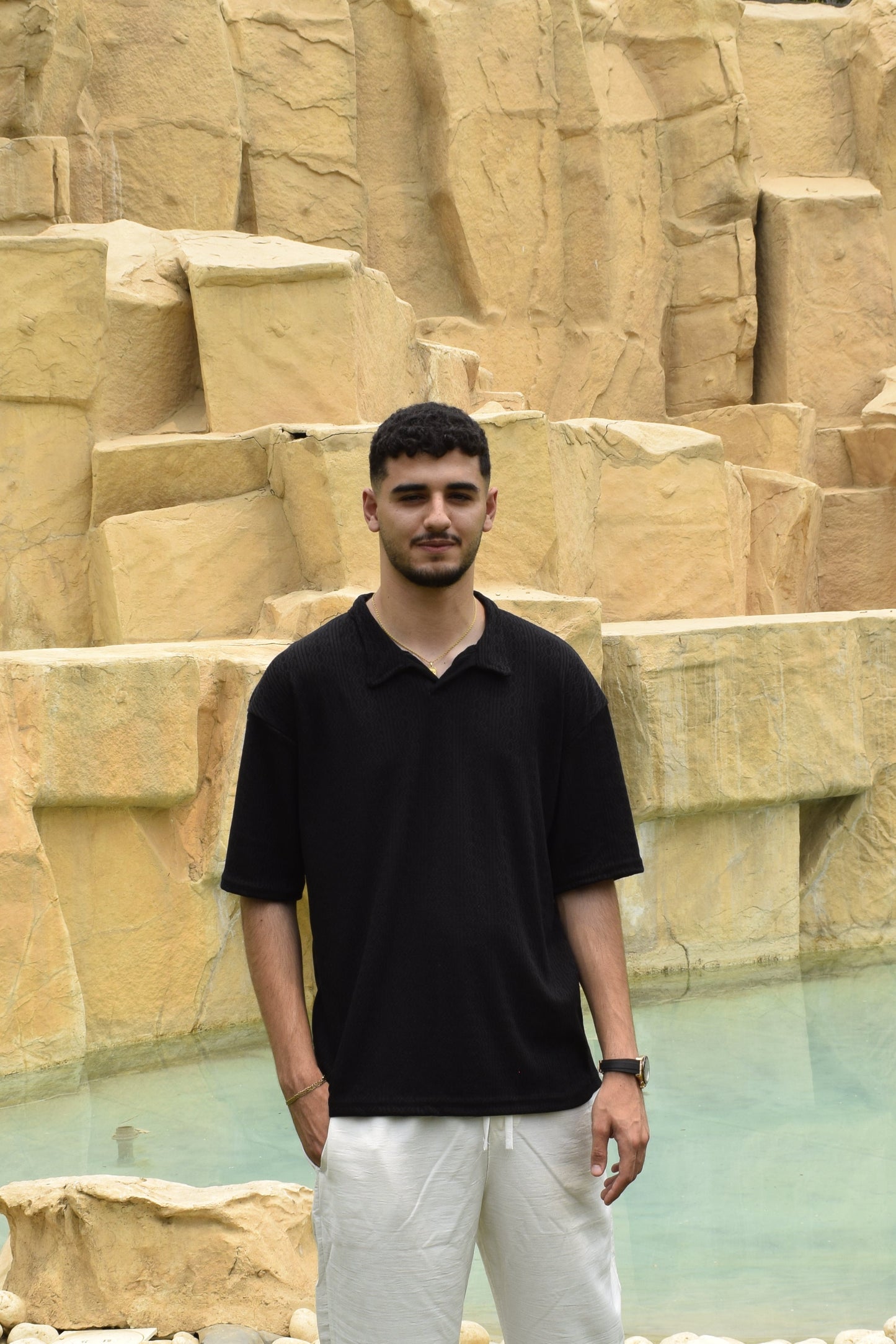 BLACK KNITTED POLO