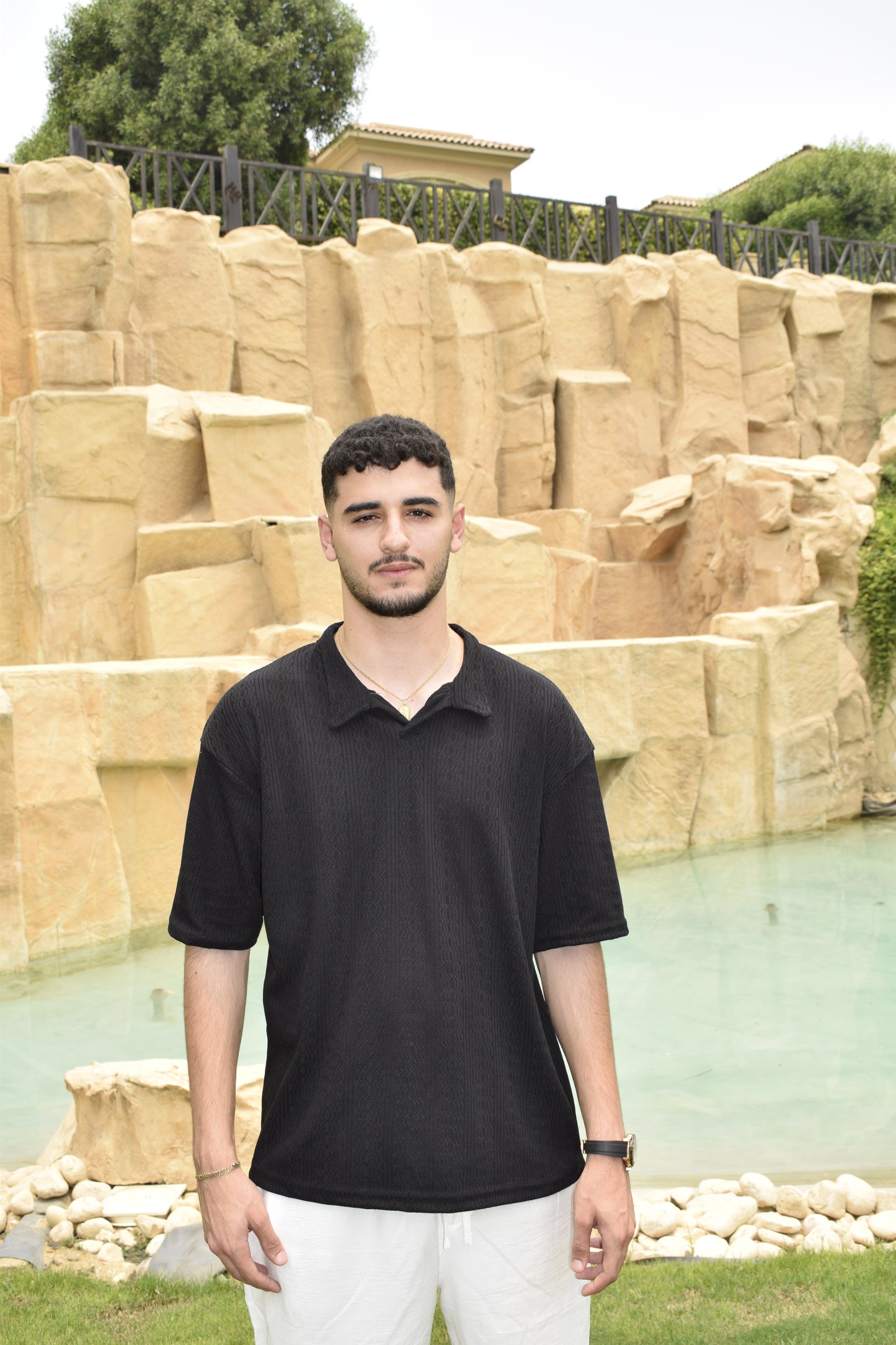 BLACK KNITTED POLO